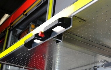 Bild: Handgriff mit zentraler Bedienung für schnellen Zugriff